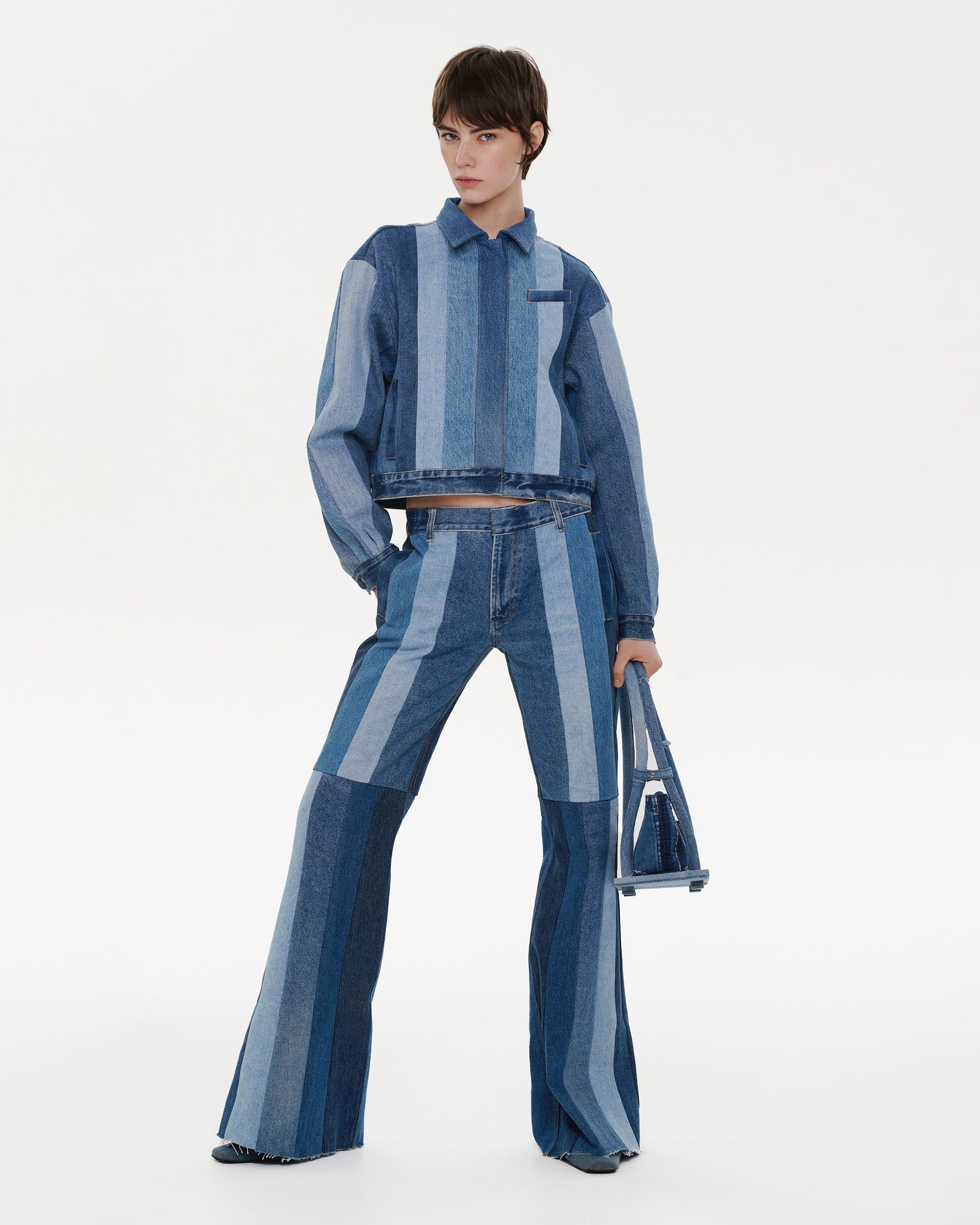 Buy Reworked Striped Flared Jeans – Bottoms by Ksenia Schnaider | Ethical & Sustainable Fashion