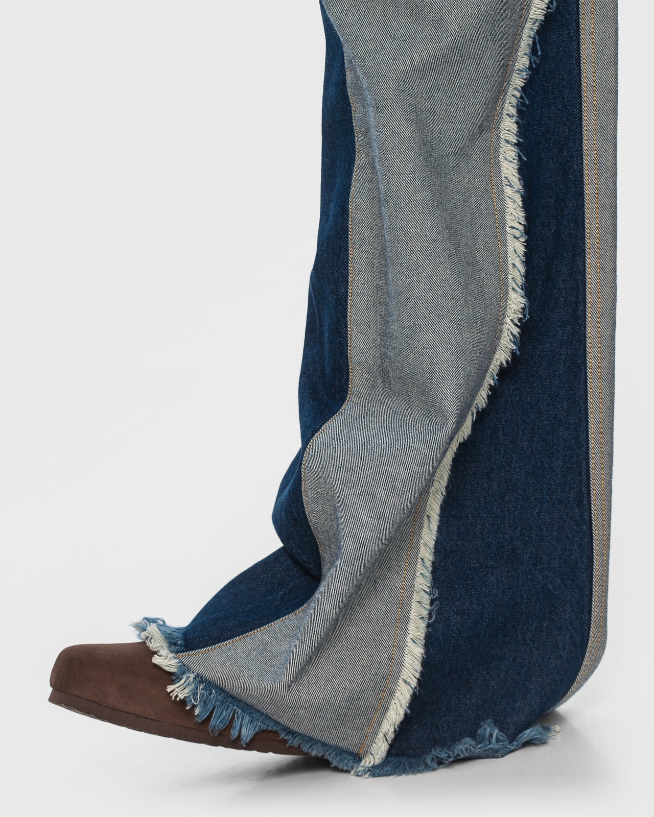 Buy Reversed Jeans with Contrast Side Lines – Bottoms by Ksenia Schnaider | Ethical & Sustainable Fashion
