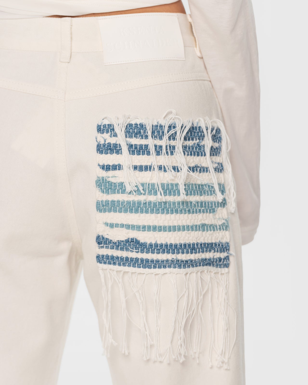 Buy Jeans with Denim Rug Detail – Bottoms by Ksenia Schnaider | Ethical & Sustainable Fashion