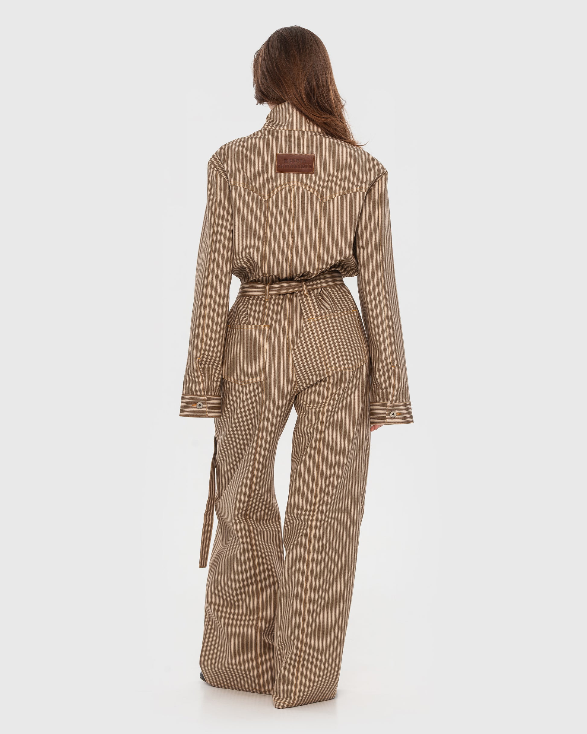 Buy Striped Denim Jumpsuit – Bottoms by Ksenia Schnaider | Ethical & Sustainable Fashion