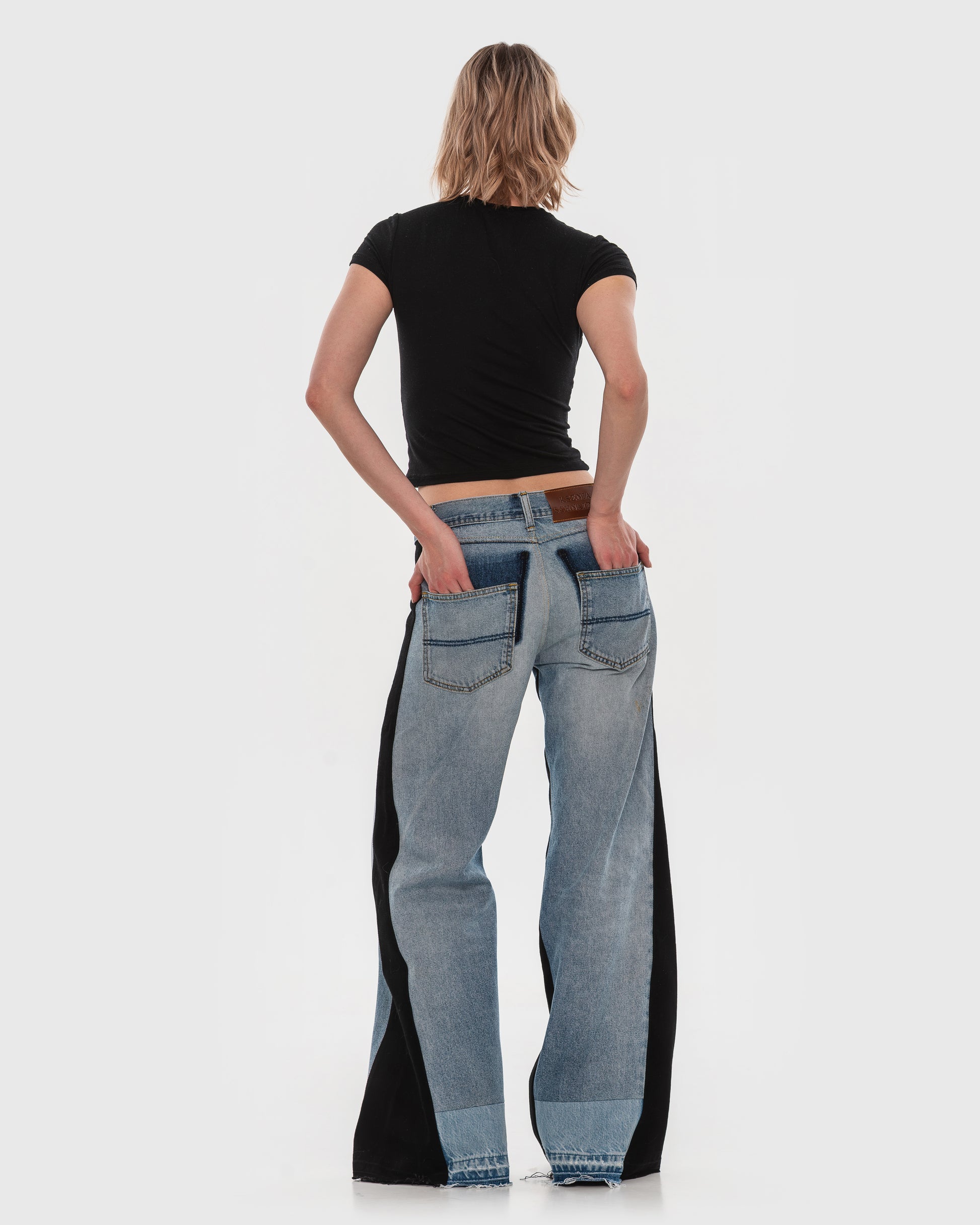 Buy Wide Jeans with Wide Contrast Side Lines – Bottoms by Ksenia Schnaider | Ethical & Sustainable Fashion