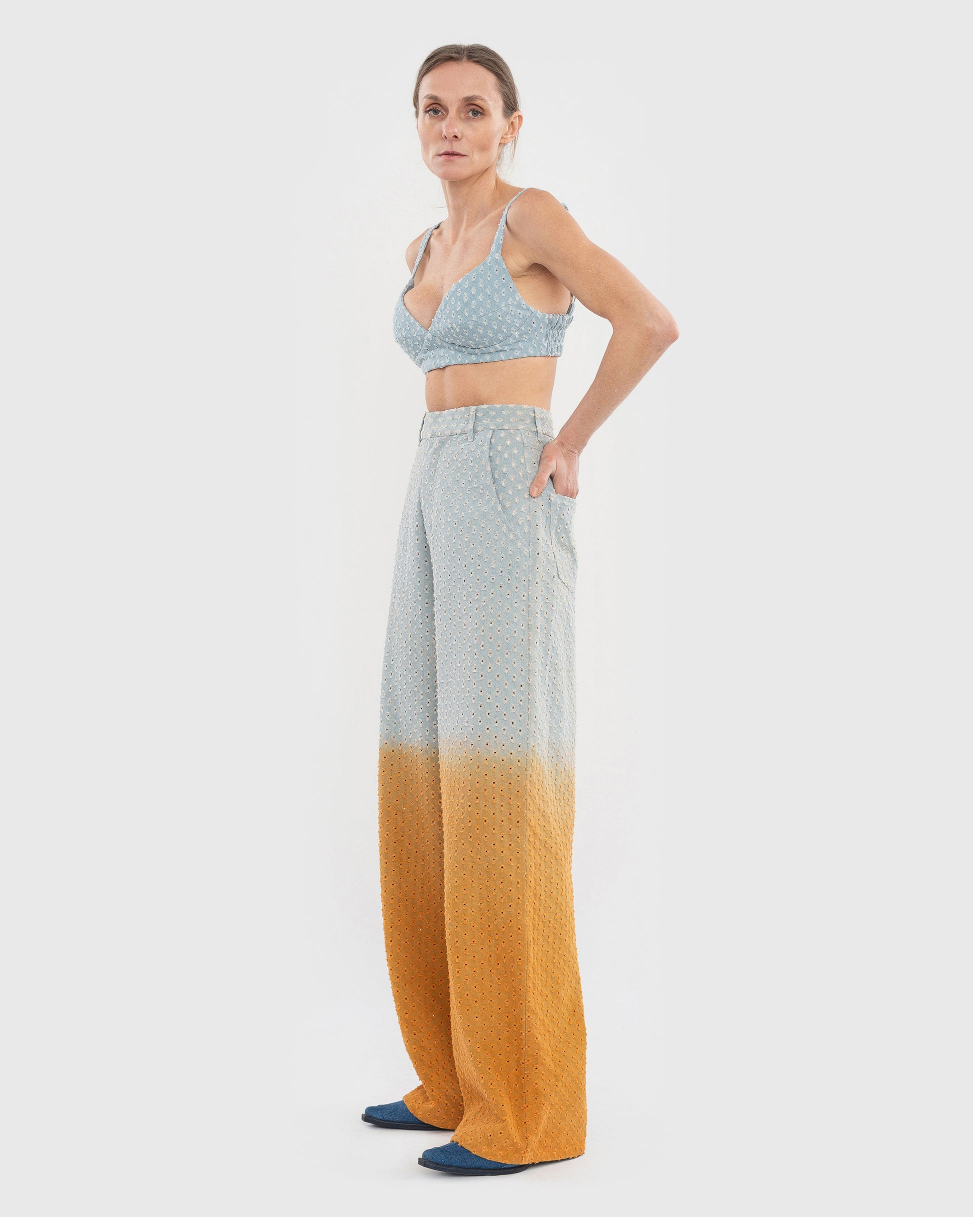 Buy Perforated Jeans with Orange Gradient – Bottoms by Ksenia Schnaider | Ethical & Sustainable Fashion