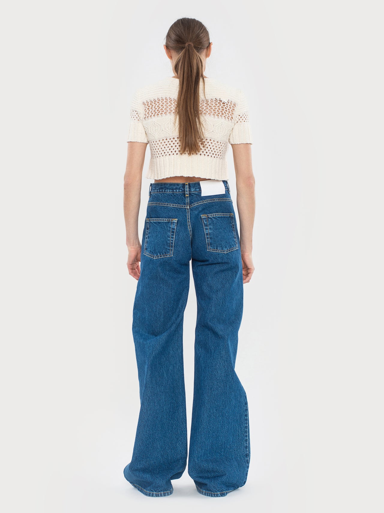 Buy Flared Jeans – Bottoms by Ksenia Schnaider | Ethical & Sustainable Fashion