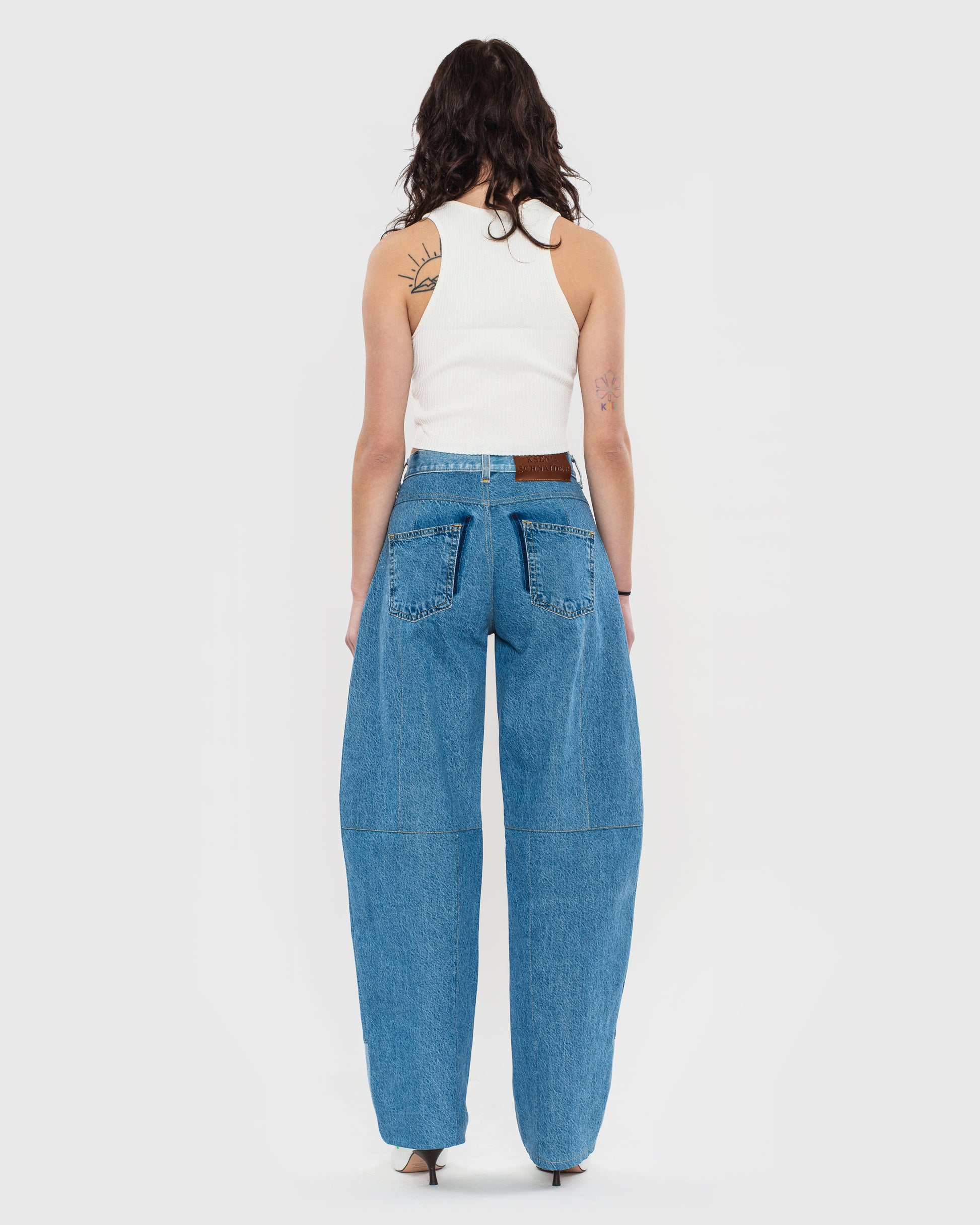 Buy Reworked Fortune Cookie Jeans – Bottoms by Ksenia Schnaider | Ethical & Sustainable Fashion