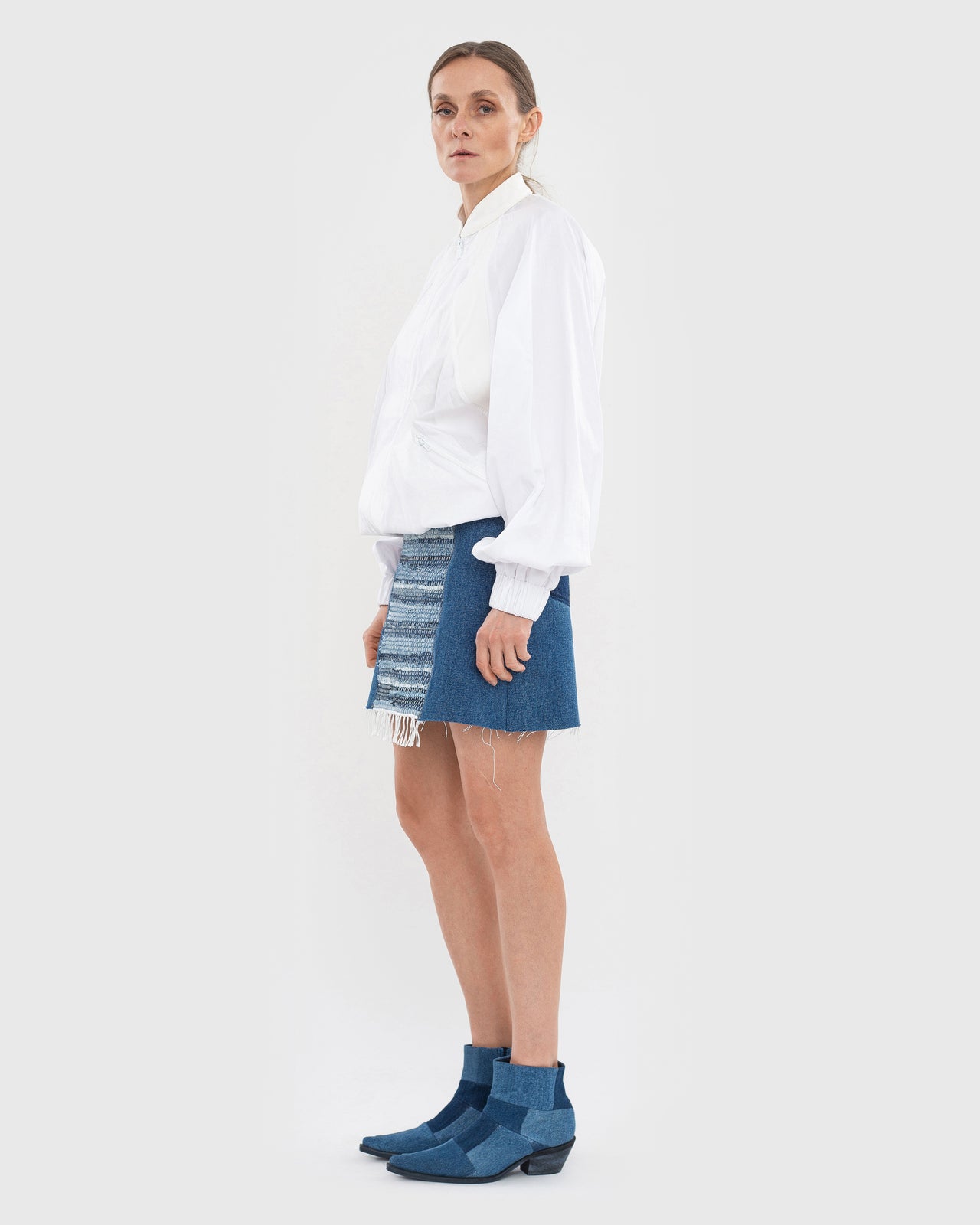 Buy Reworked Mini Skirt with Denim Rug Detail – Bottoms by Ksenia Schnaider | Ethical & Sustainable Fashion