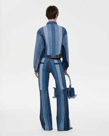 Buy Reworked Striped Flared Jeans – Bottoms by Ksenia Schnaider | Ethical & Sustainable Fashion